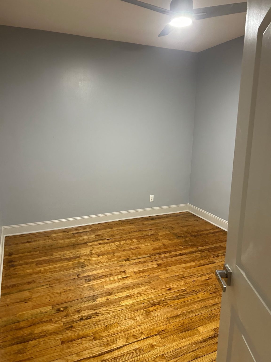 Bedroom with hardwood floors